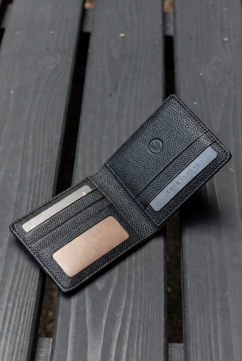 RM Williams black leather bifold wallet open showing card slots